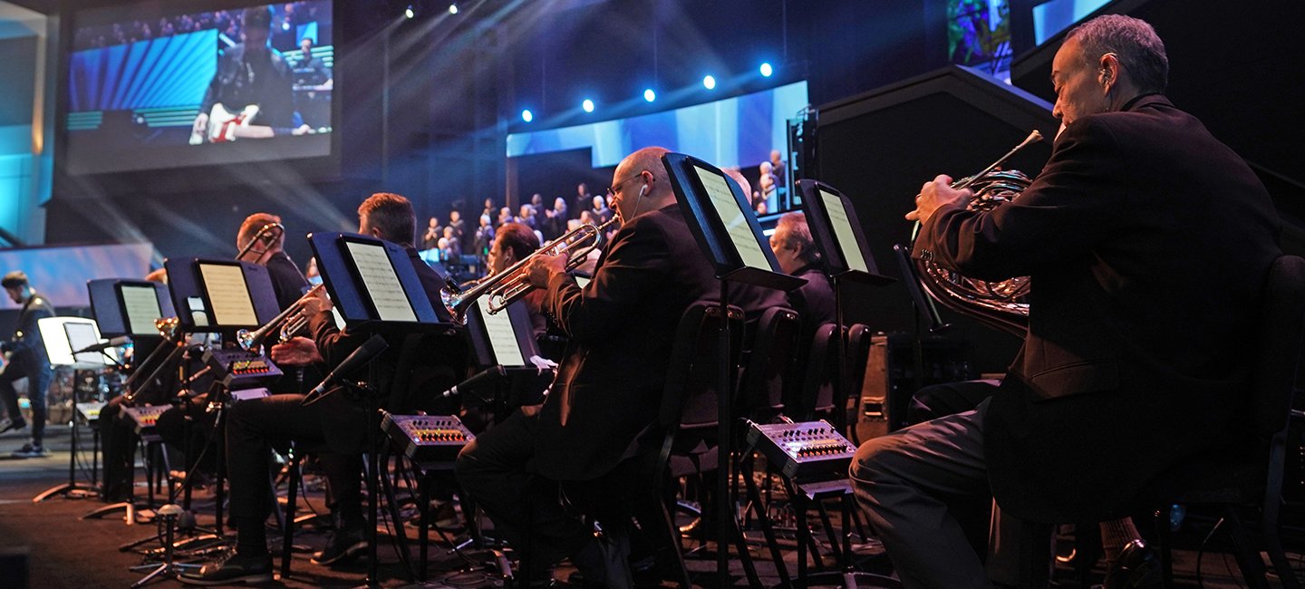Musicians in Prestonwood’s orchestra playing on stage